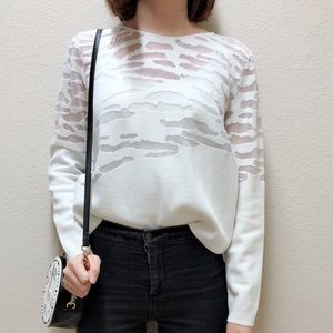 Nice white top with hollow out details from COS
